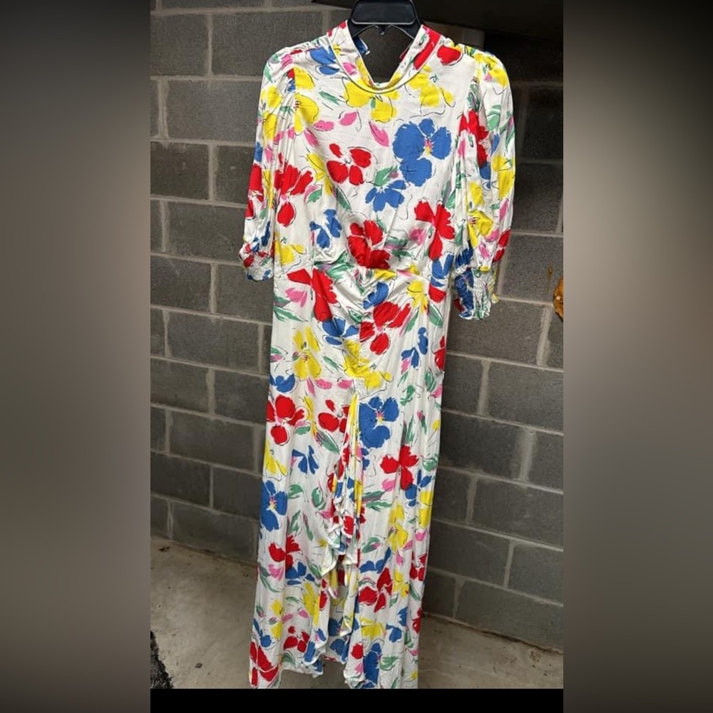 PIXO dress. Multicolor. Flirty dress with slit.